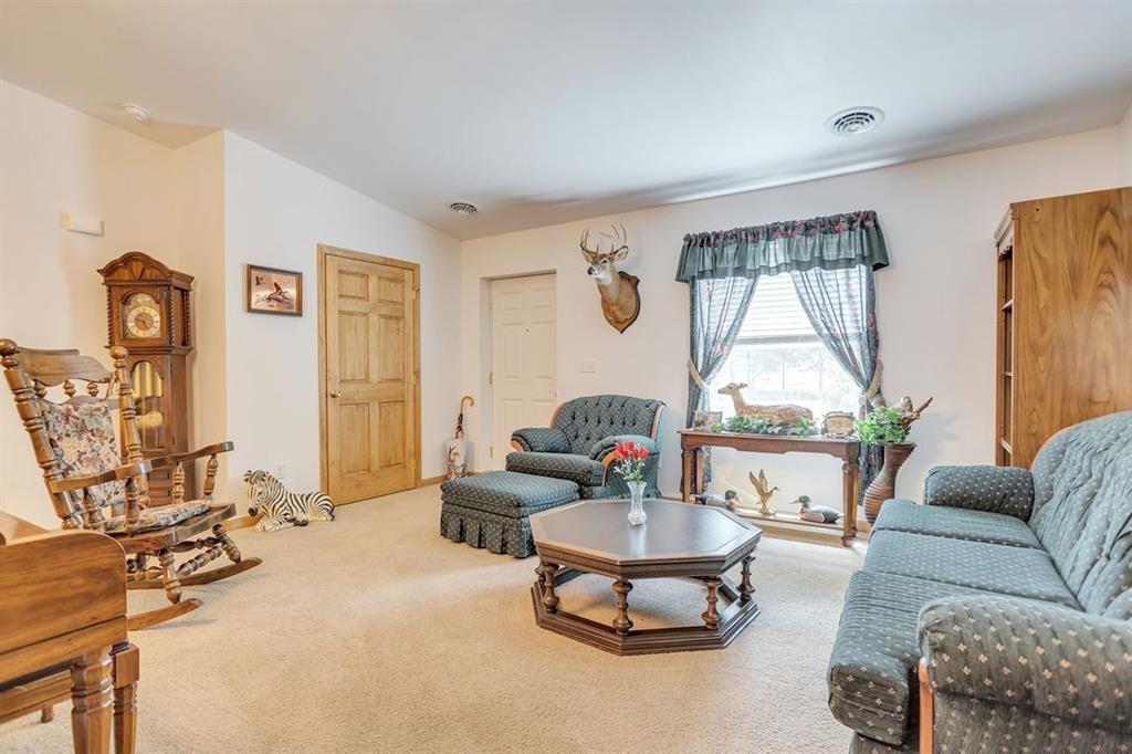 1130 Ridge Road Templeton, PA 16259 - Photo 5 of 25 a living room with furniture and a large window