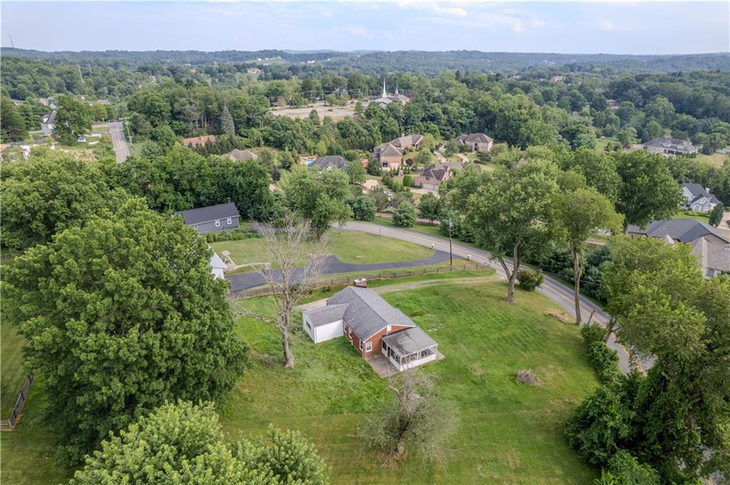 421 Hays Road Venetia, PA 15367 - Photo 28 of 28 an aerial view of green landscape with trees houses and mountain view
