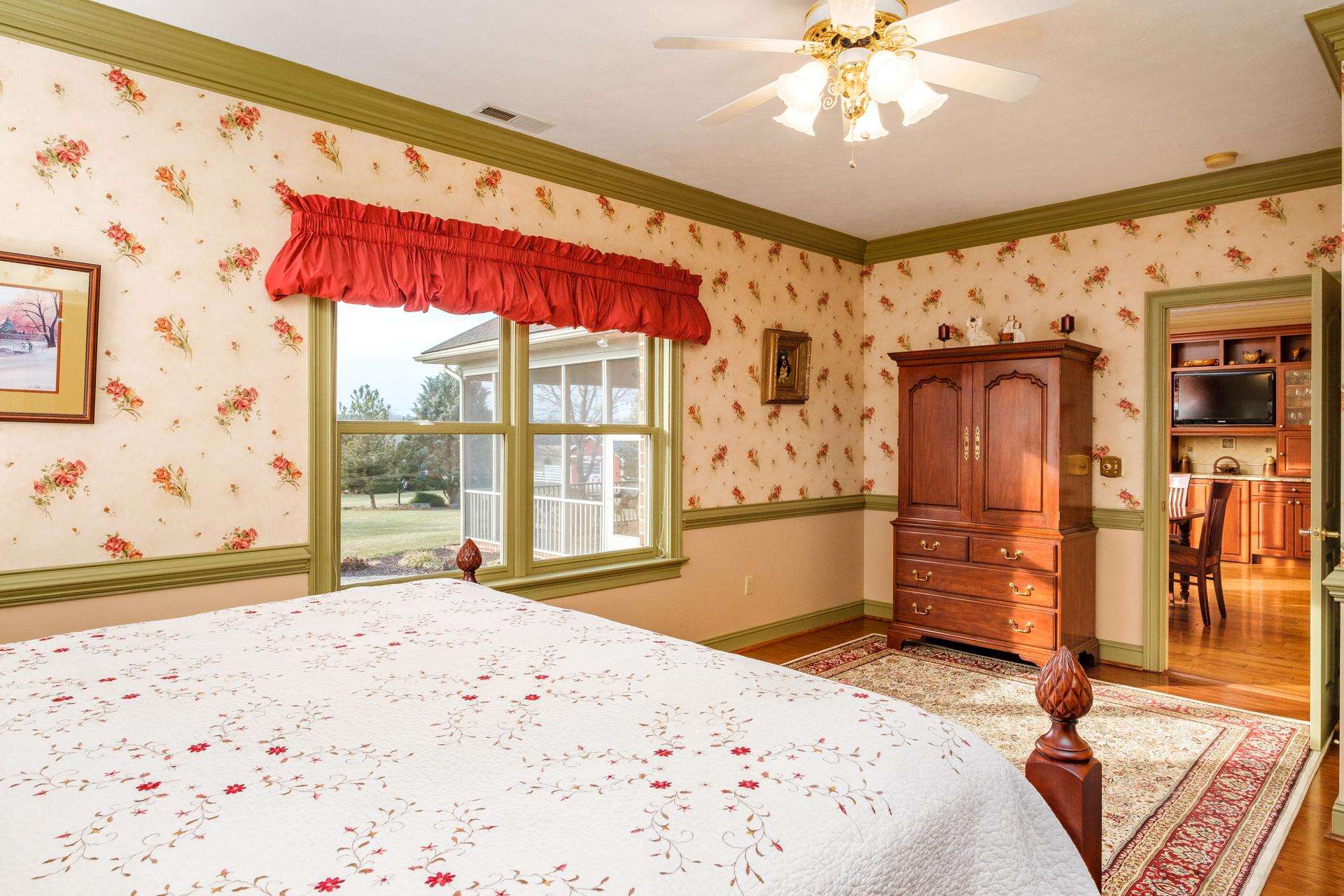 2390 Battlefield Road Grottoes, VA 24441 - Photo 34 of 72 a bedroom with a bed and a dresser next to a window