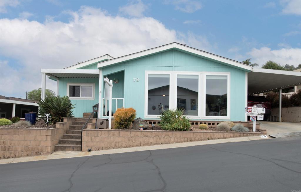 a house view with a outdoor space