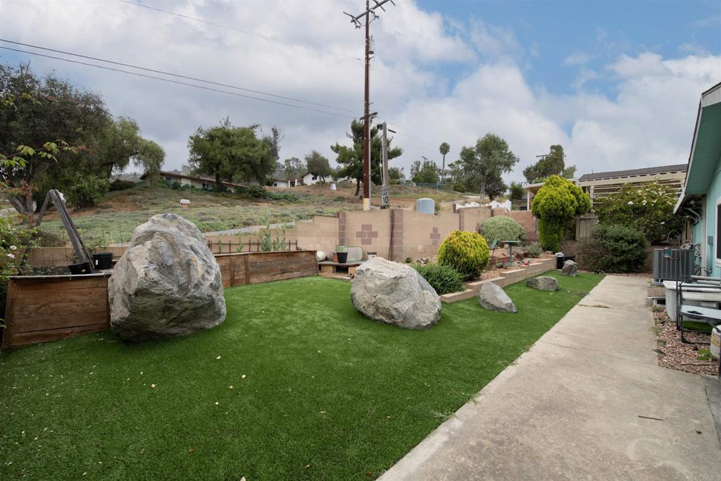 909 Richland Road, Unit 79 San Marcos, CA 92069 - Photo 5 of 17 a garden view with lake view