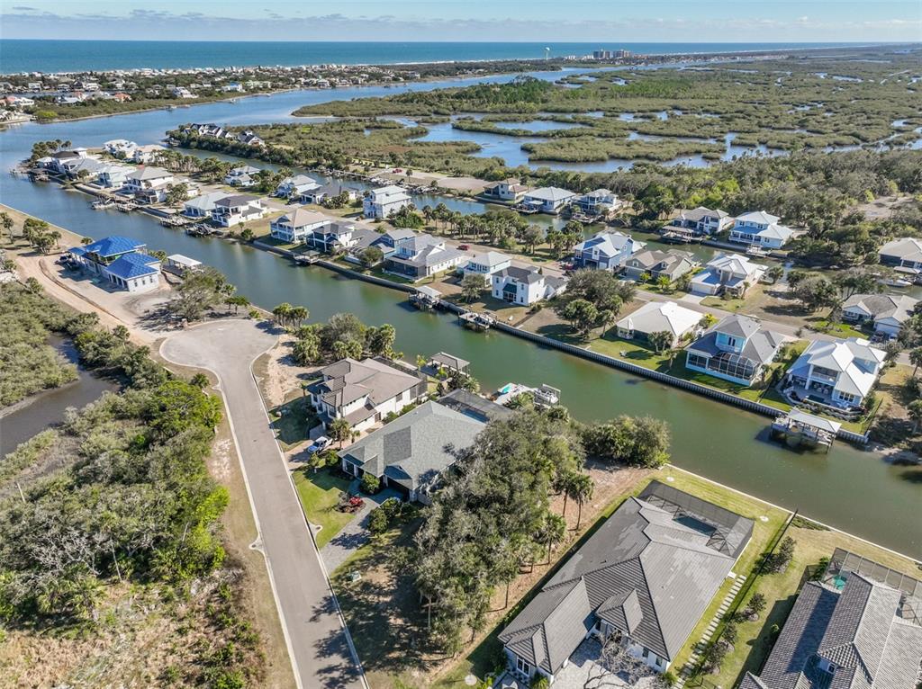 132 Marsh Point Flagler Beach, FL 32136 - Photo 21 of 31 an aerial view of a house with a lake view