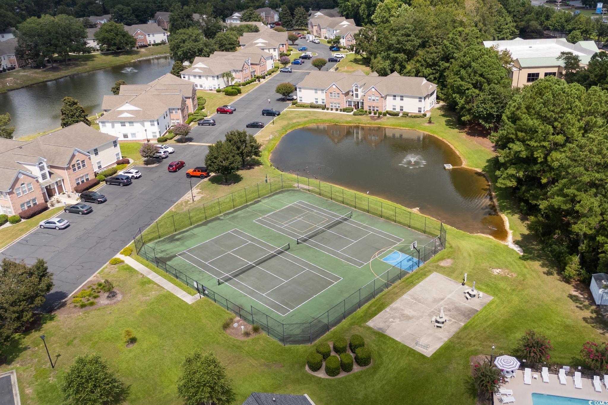 4283 Santolina Way, Unit D Murrells Inlet, SC 29576 - Photo 29 of 31 Aerial perspective of suburban area featuring a nearby body of water