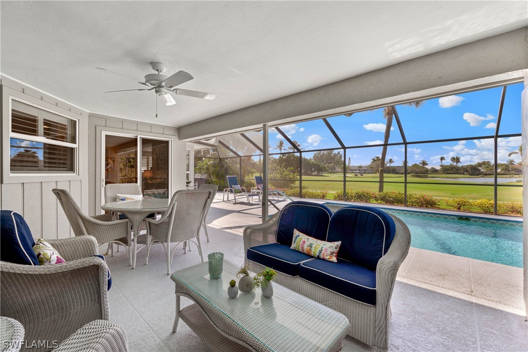975 Sand Castle Road Sanibel, FL 33957 - Photo 20 of 24 a living room with furniture and a large window