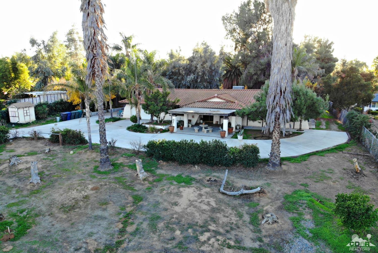 2132 John Street Riverside, CA 92503 - Photo 1 of 52 a view of a patio with furniture and a garden