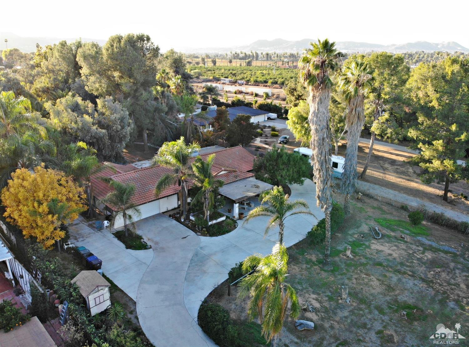 2132 John Street Riverside, CA 92503 - Photo 11 of 52 a view of a garden with lawn chairs