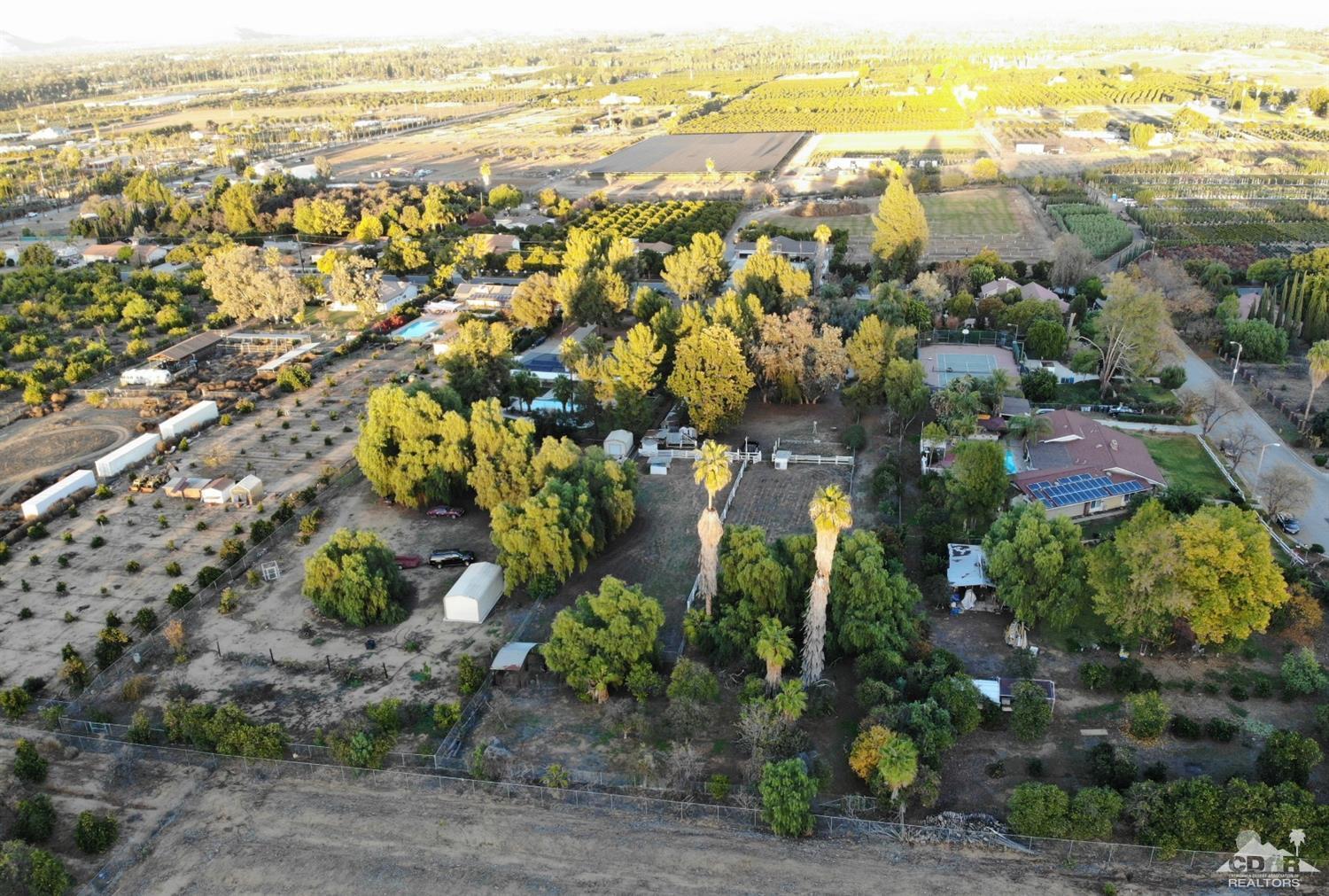 2132 John Street Riverside, CA 92503 - Photo 12 of 52 an aerial view of residential houses with outdoor space and swimming pool