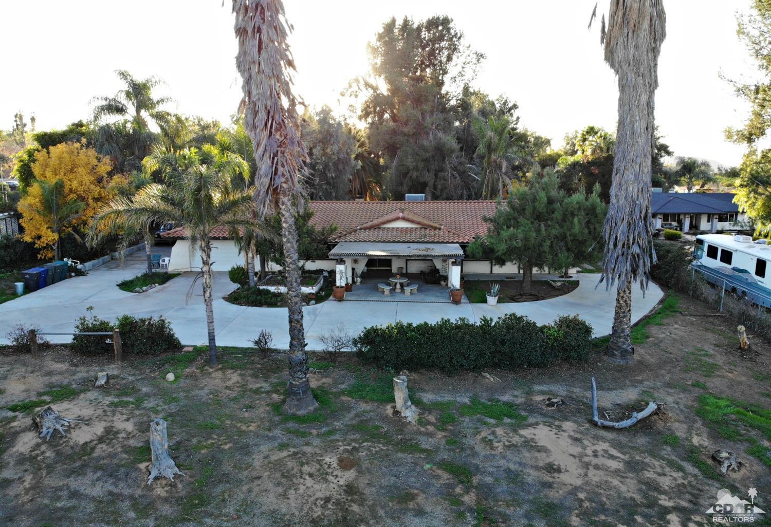 2132 John Street Riverside, CA 92503 - Photo 21 of 52 a view of a house with backyard and sitting area