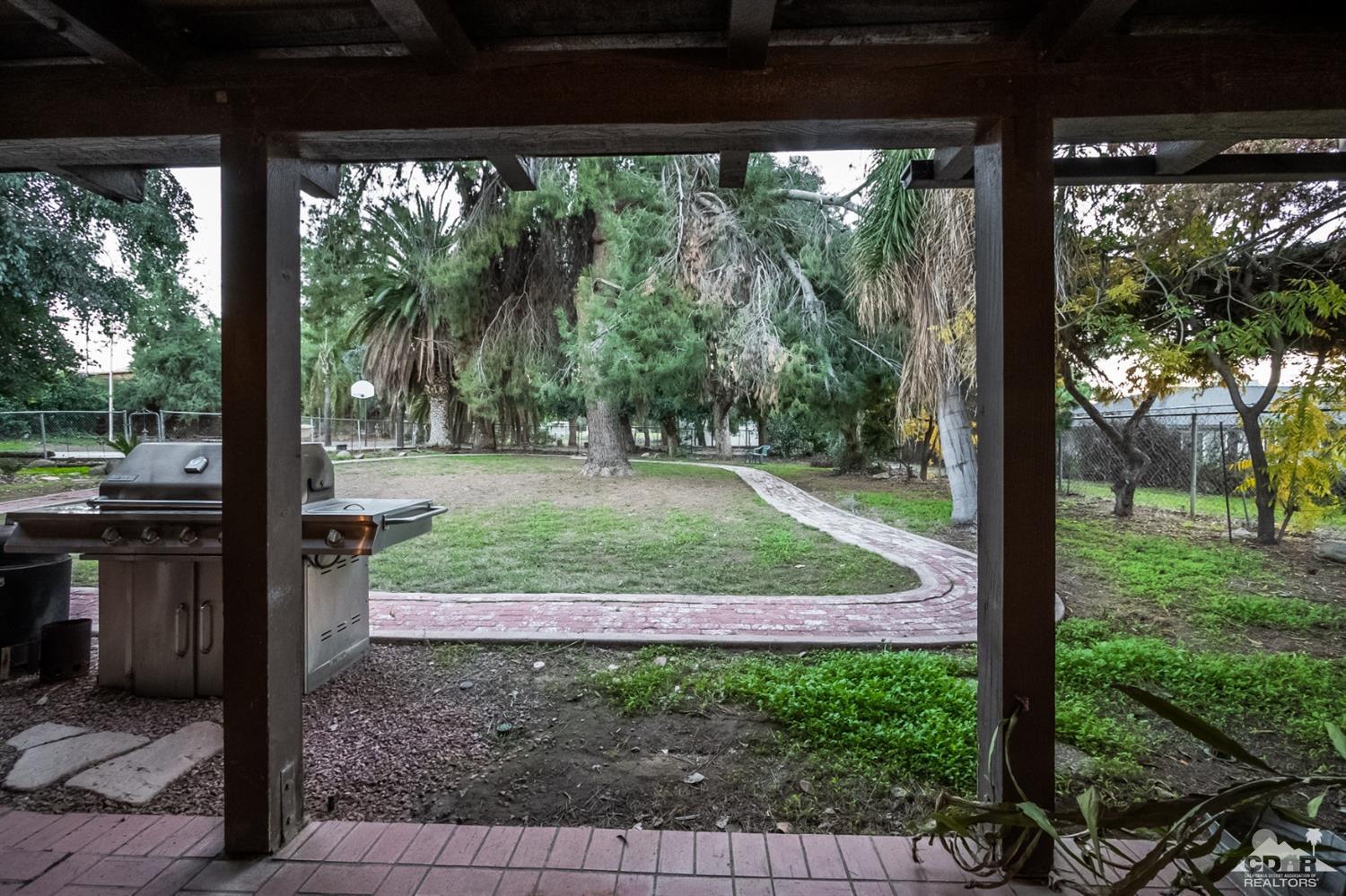 2132 John Street Riverside, CA 92503 - Photo 23 of 52 a view of a porch with furniture and garden