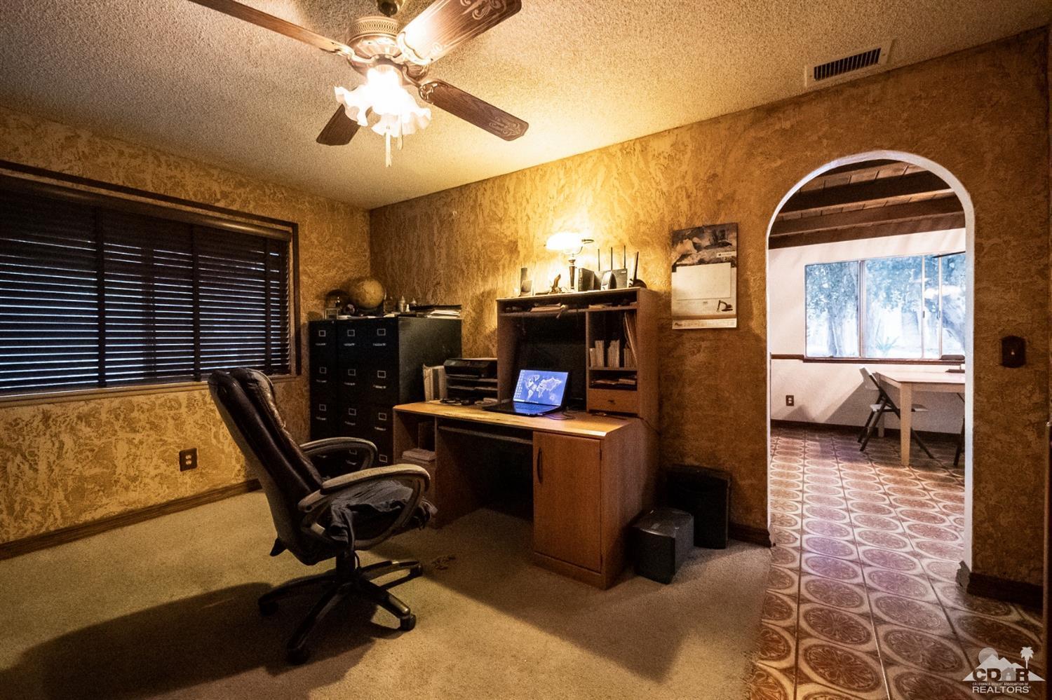 2132 John Street Riverside, CA 92503 - Photo 29 of 52 a view of a workspace with furniture
