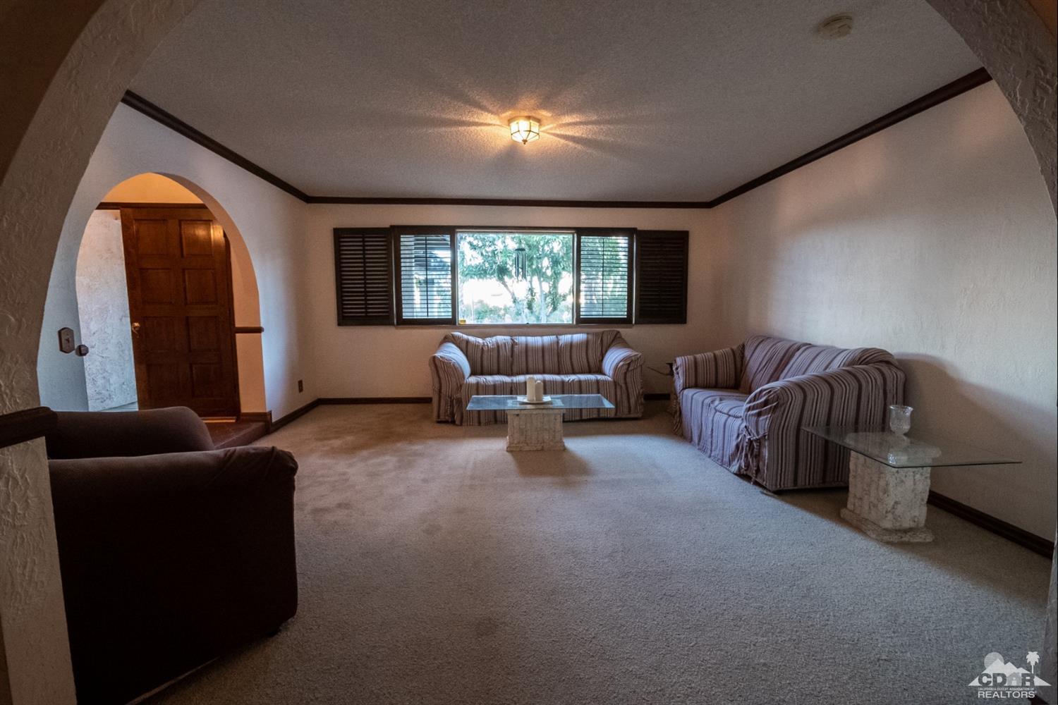 2132 John Street Riverside, CA 92503 - Photo 47 of 52 a living room with furniture and a large window