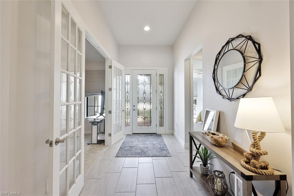 9431 Greyhawk Trail Naples, FL 34120 - Photo 25 of 50 a very nice looking room with a large window
