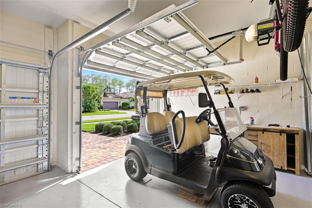 9431 Greyhawk Trail Naples, FL 34120 - Photo 33 of 50 a view of a room with gym equipment