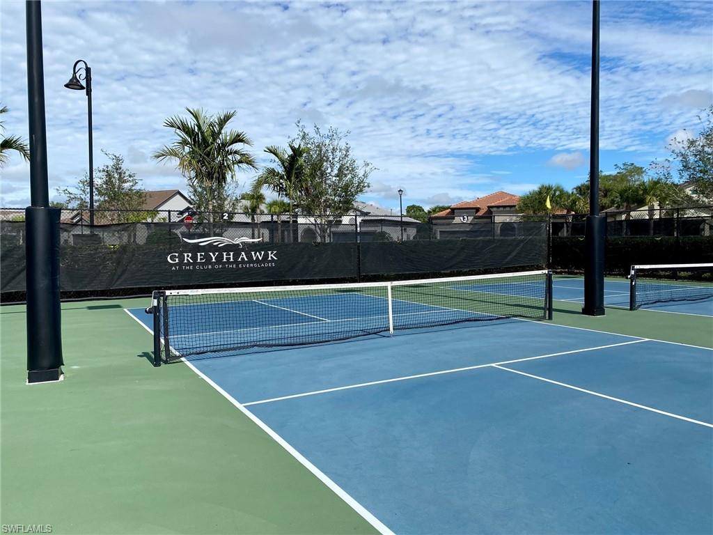 9431 Greyhawk Trail Naples, FL 34120 - Photo 47 of 50 a view of a tennis court
