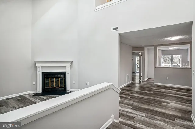 a view of empty room with windows