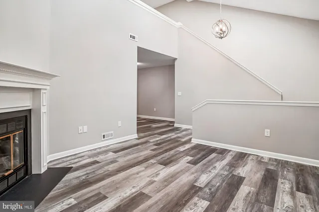 a living room with a fireplace