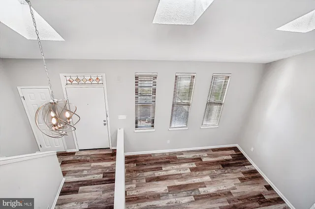 a view of deck with wooden floor and wooden fence