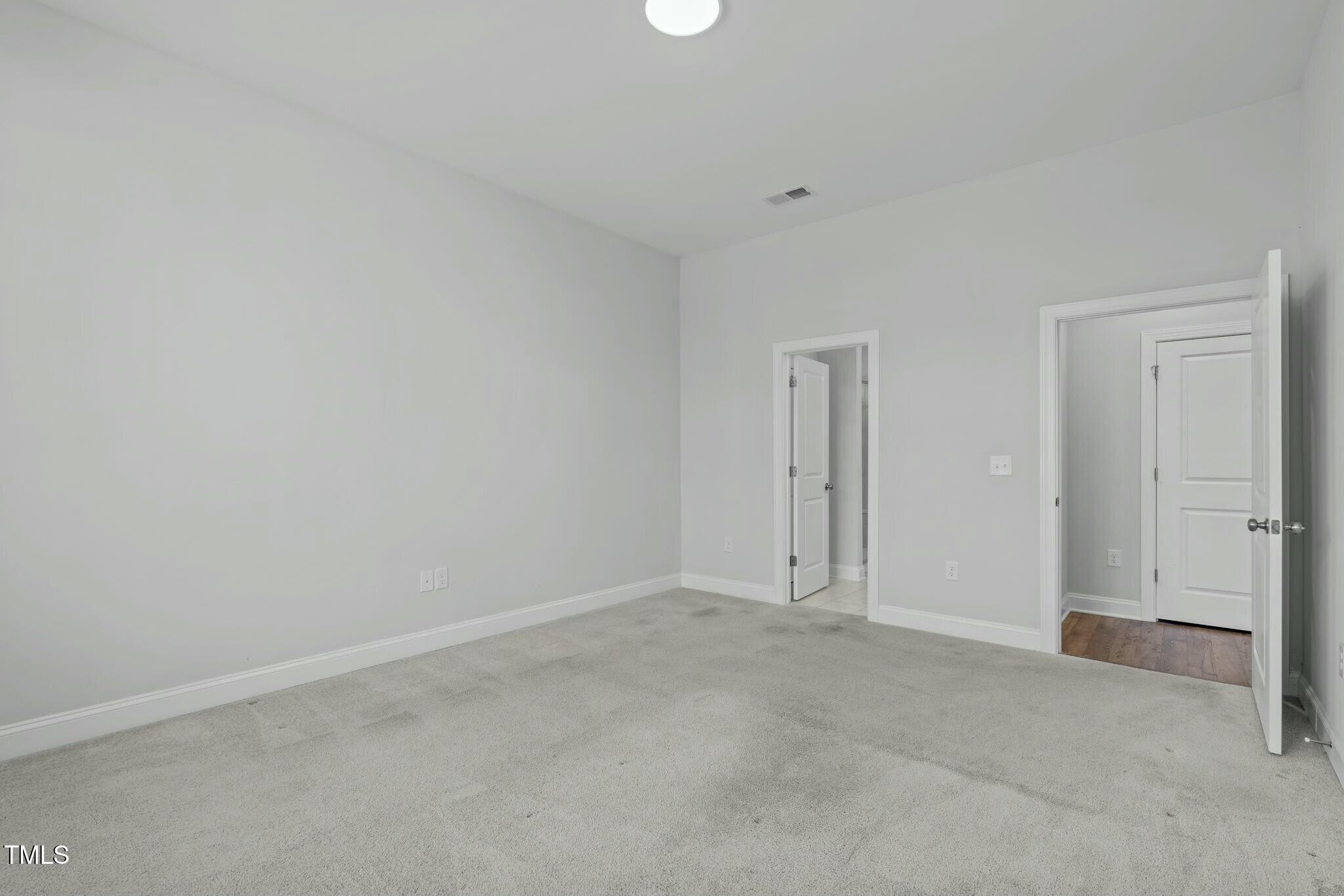 6417 Truxton Lane Raleigh, NC 27616 - Photo 22 of 47 a view of an empty room