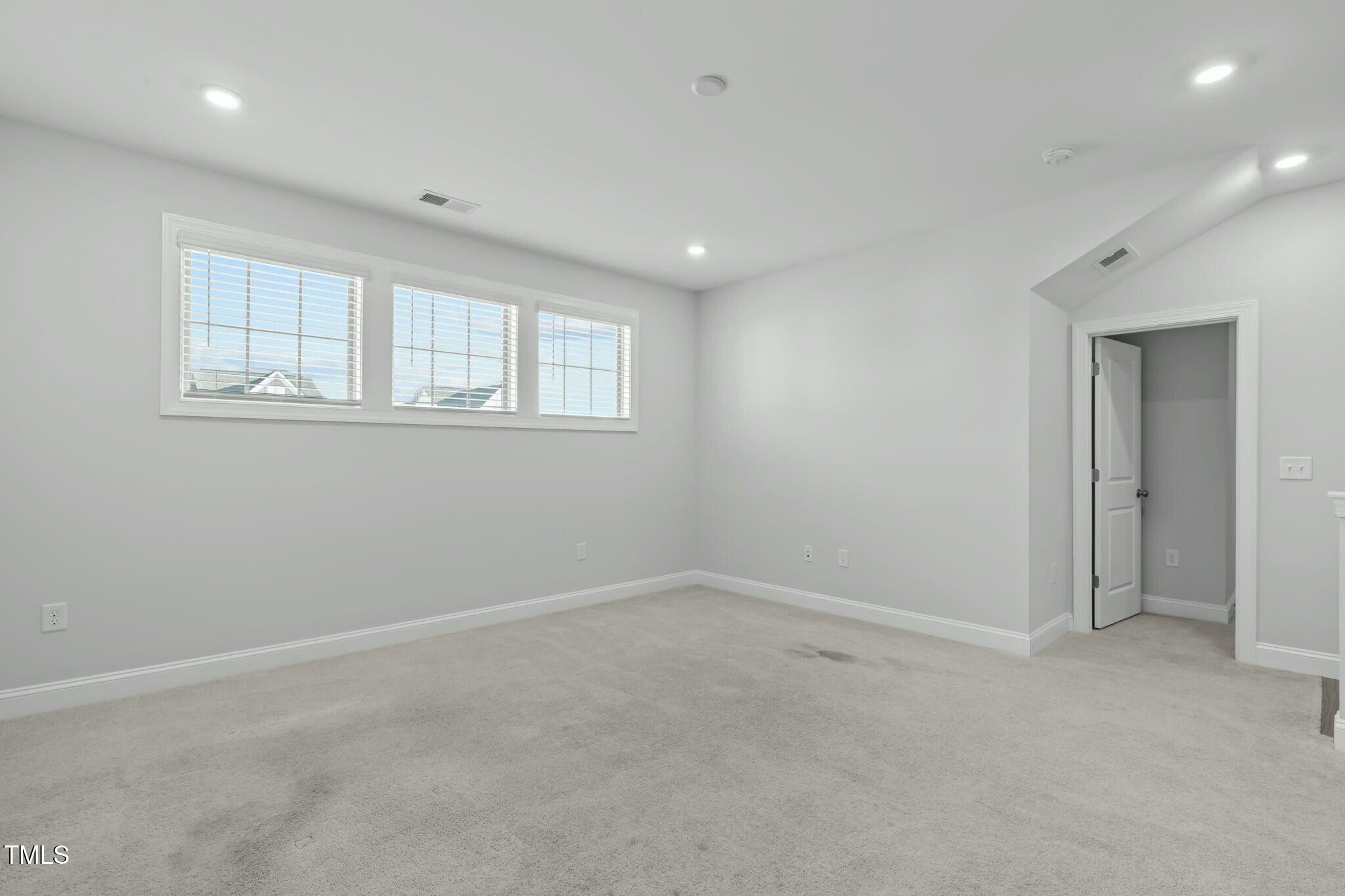 6417 Truxton Lane Raleigh, NC 27616 - Photo 29 of 47 an empty room with windows and closet