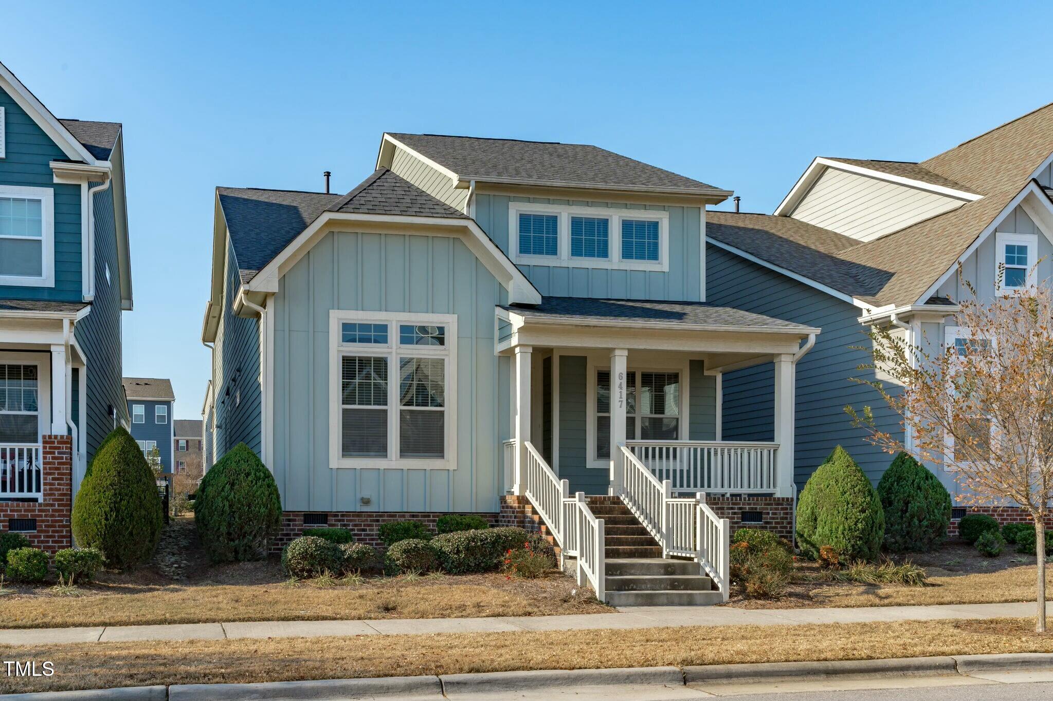 6417 Truxton Lane Raleigh, NC 27616 - Photo 3 of 47 a front view of a house with a porch