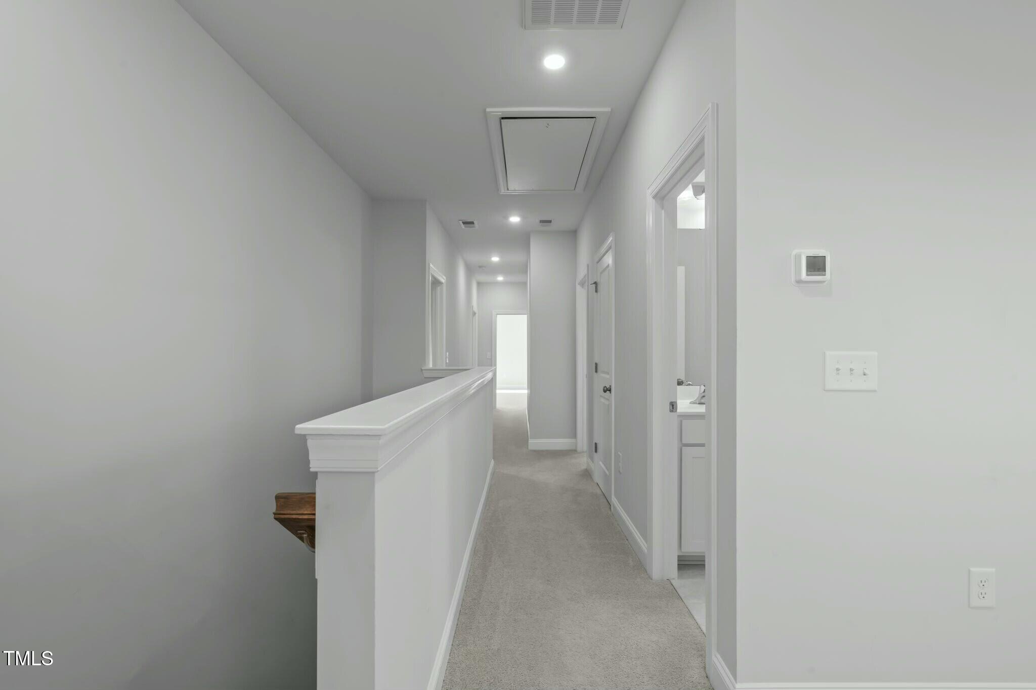 6417 Truxton Lane Raleigh, NC 27616 - Photo 31 of 47 a view of a hallway with an entryway