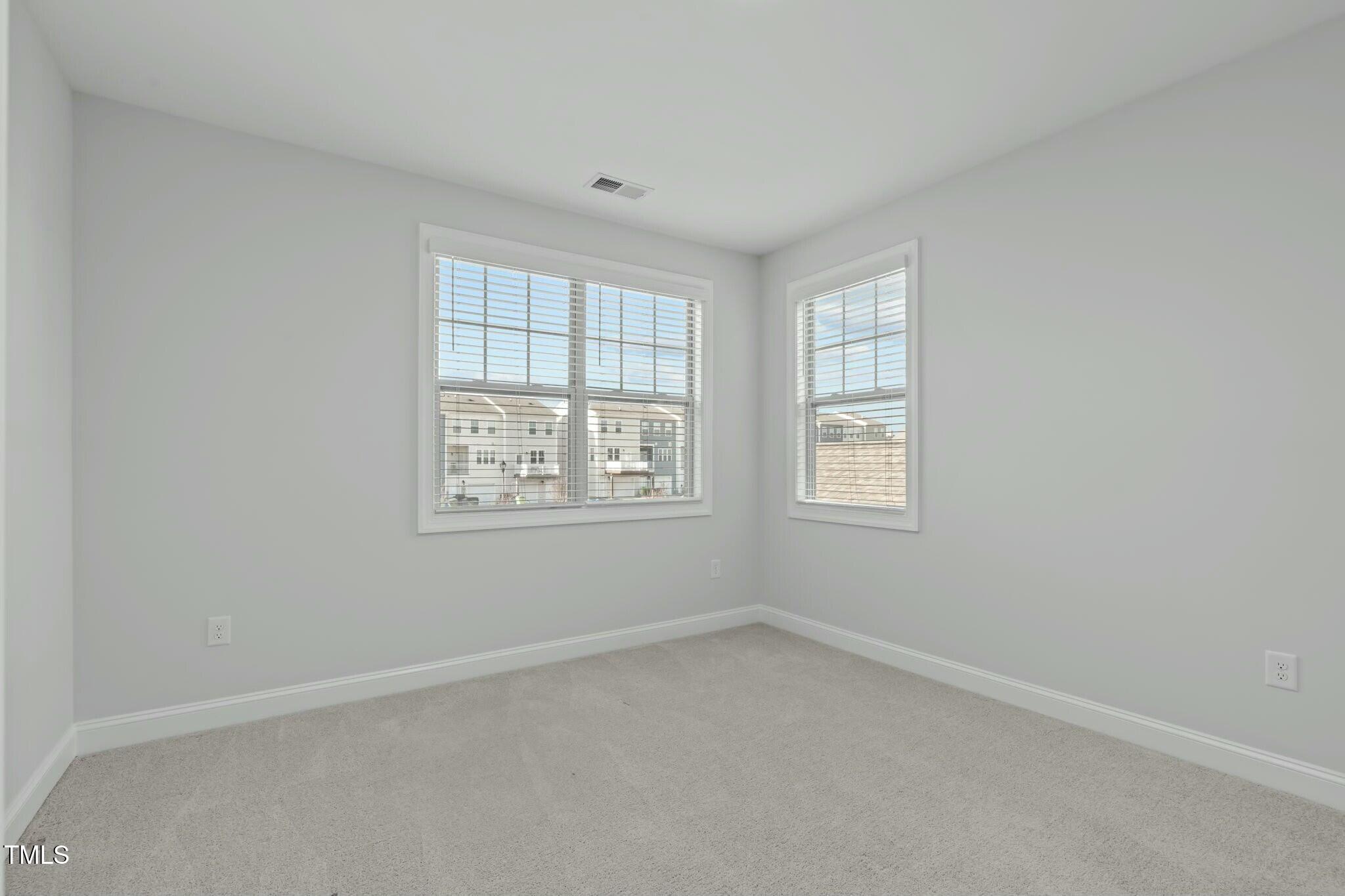 6417 Truxton Lane Raleigh, NC 27616 - Photo 35 of 47 an empty room with a window