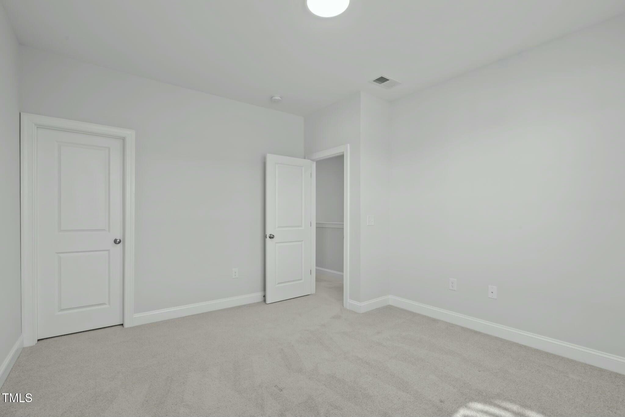 6417 Truxton Lane Raleigh, NC 27616 - Photo 36 of 47 a view of an empty room