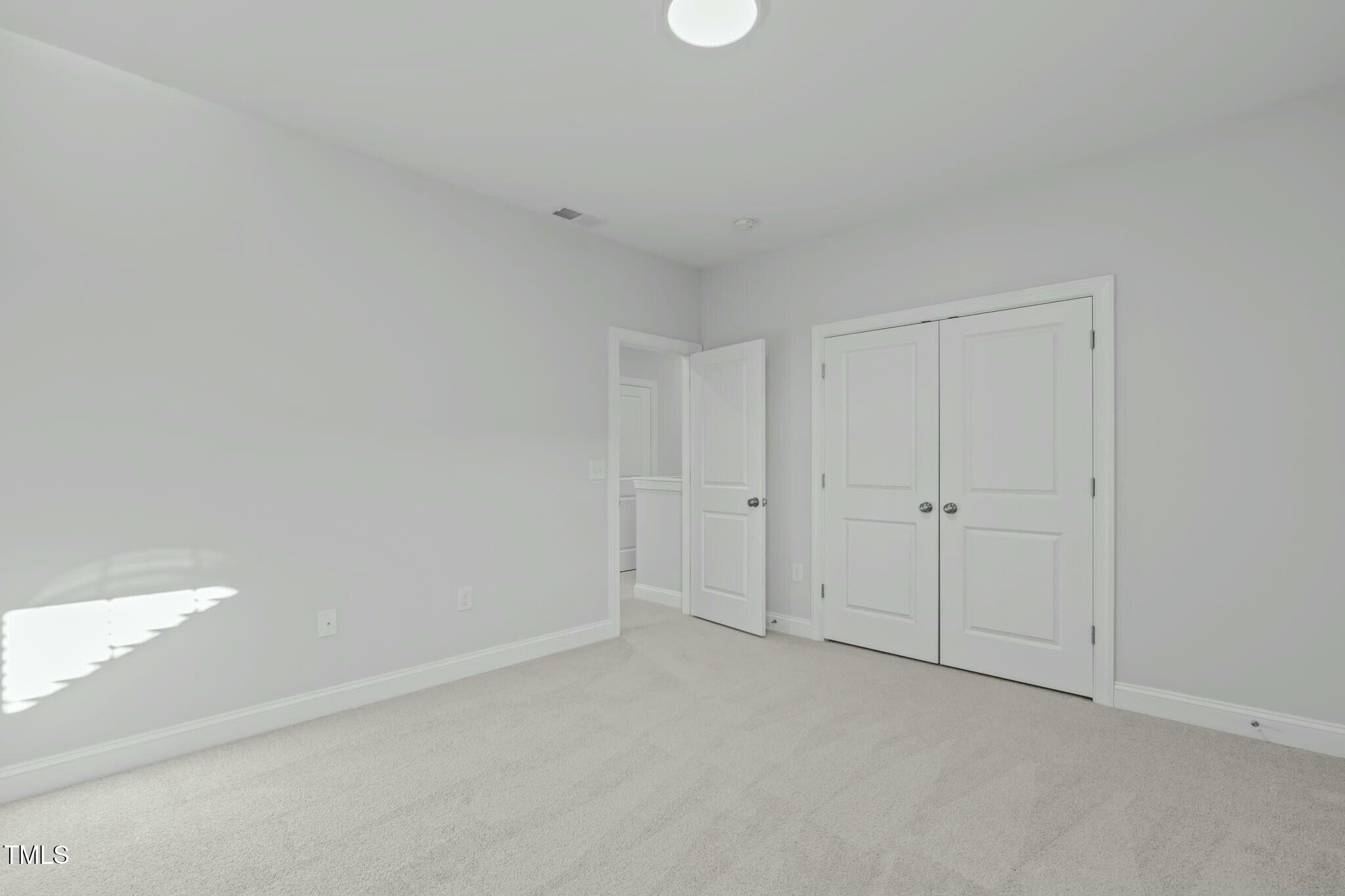 6417 Truxton Lane Raleigh, NC 27616 - Photo 38 of 47 a view of an empty room