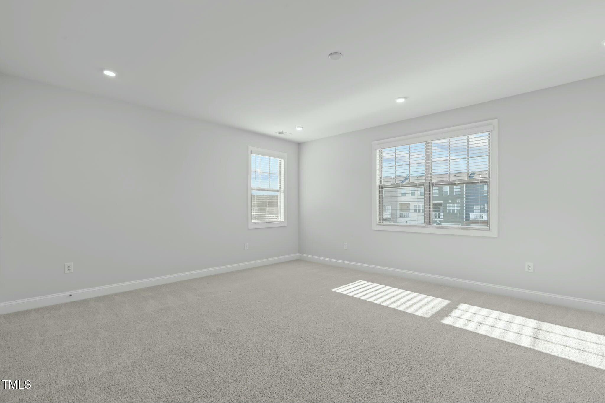 6417 Truxton Lane Raleigh, NC 27616 - Photo 40 of 47 an empty room with windows