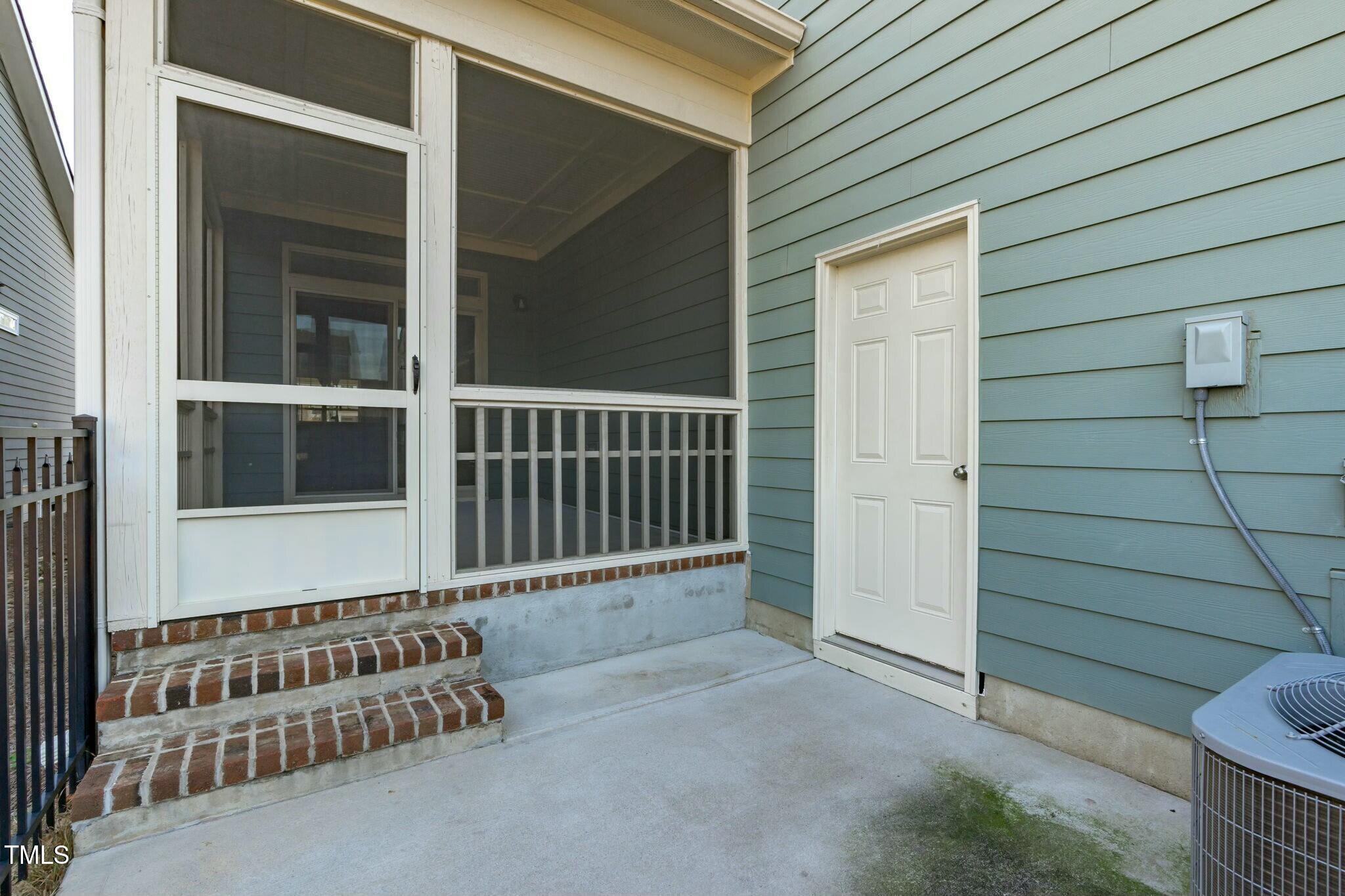 6417 Truxton Lane Raleigh, NC 27616 - Photo 44 of 47 a view of a porch with a chair