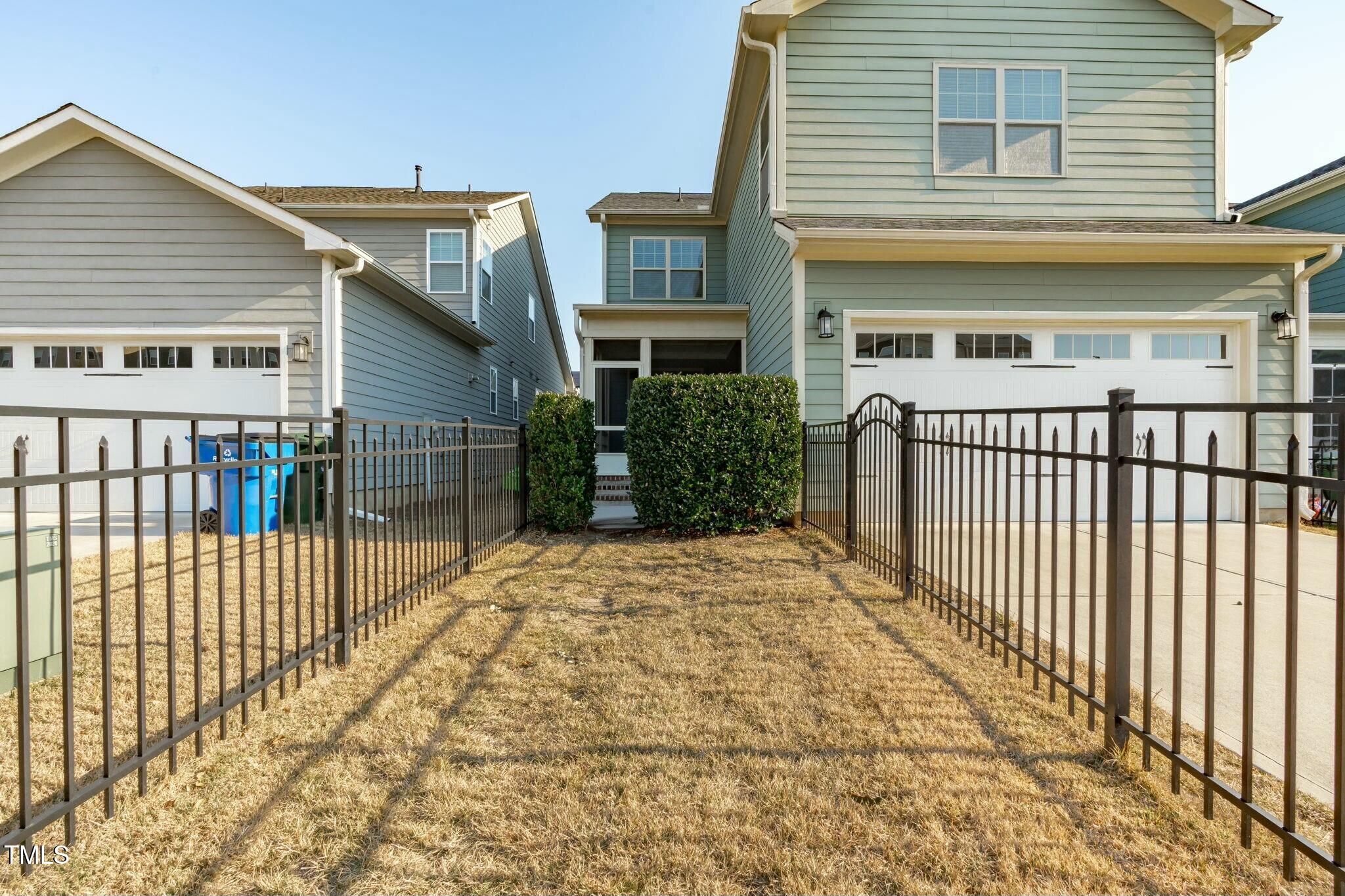 6417 Truxton Lane Raleigh, NC 27616 - Photo 46 of 47 a view of a house with wooden fence