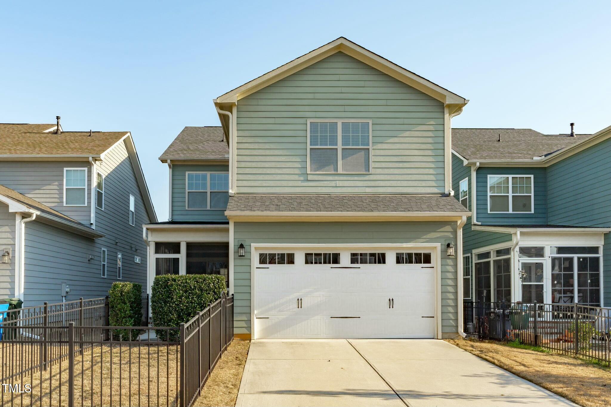 6417 Truxton Lane Raleigh, NC 27616 - Photo 47 of 47 a front view of a house with a garden