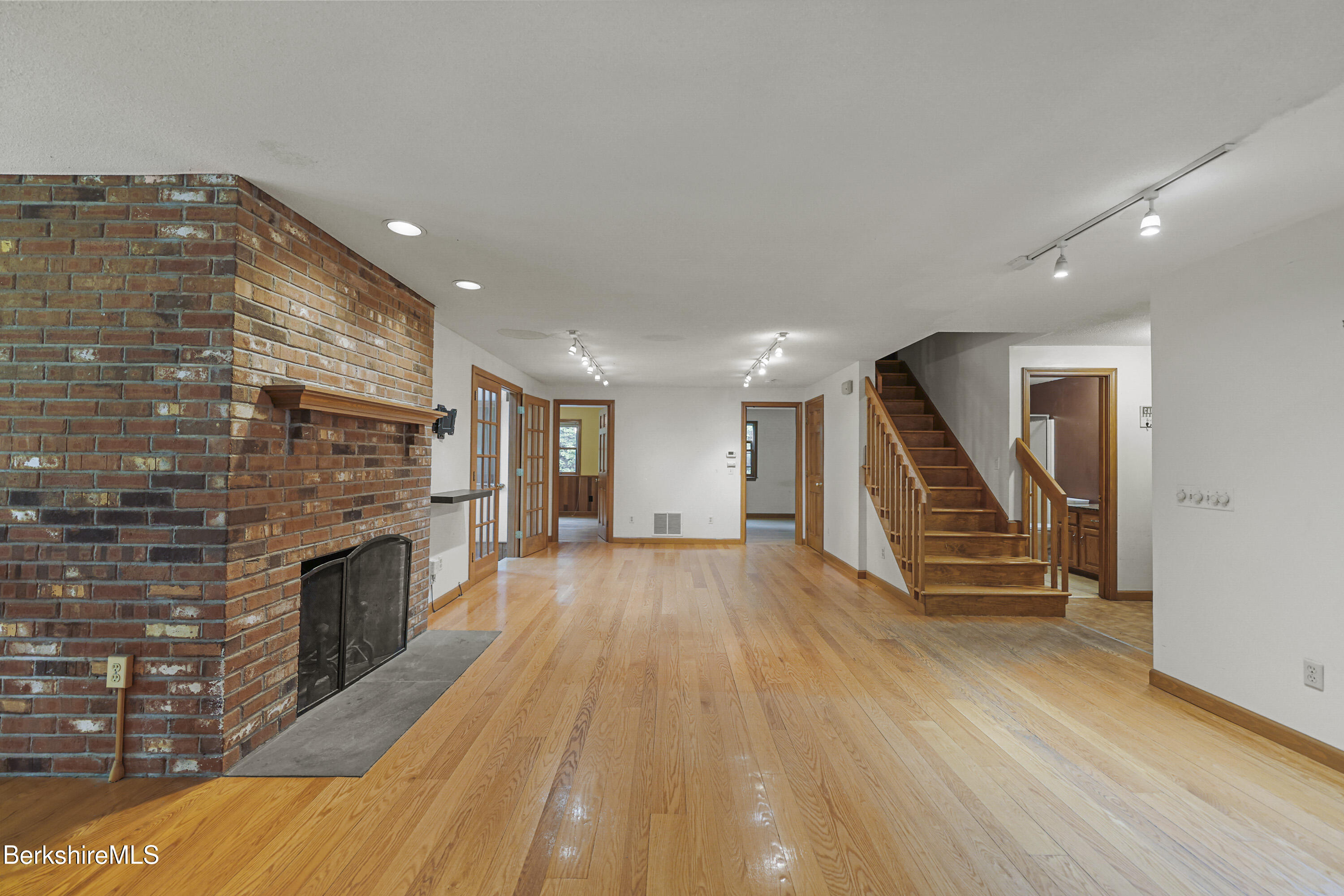915 High St Hill Road Windsor, MA 01270 - Photo 4 of 54 wooden floor in an empty room with a fireplace
