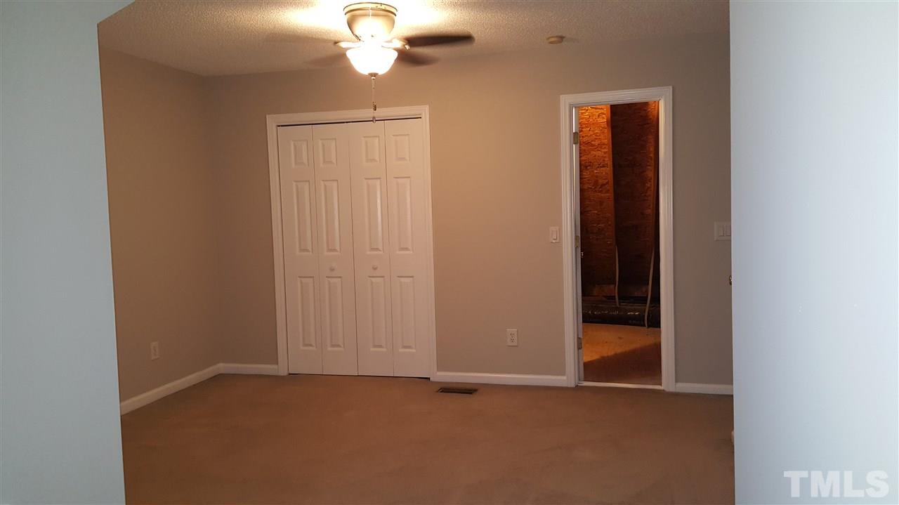 6036 Epping Forest Drive Raleigh, NC 27613 - Photo 16 of 21 View 1 of 3rd floor bonus room facing closet and Walk-in attic access