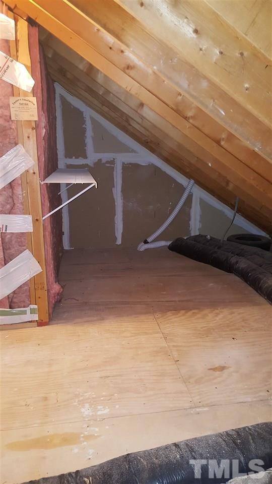 6036 Epping Forest Drive Raleigh, NC 27613 - Photo 17 of 21 Floored walk-in attic located off 3rd floor off the bonus room