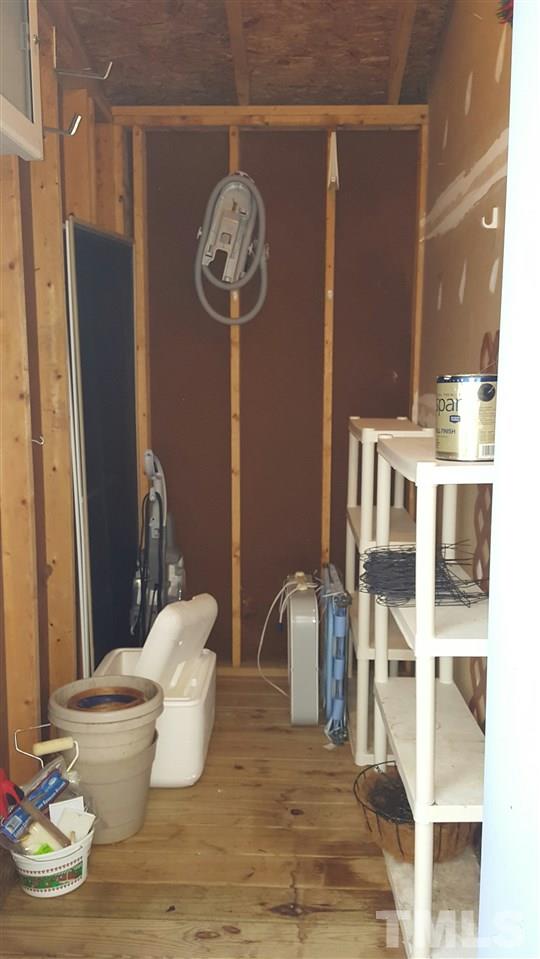 6036 Epping Forest Drive Raleigh, NC 27613 - Photo 19 of 21 Storage room located off the back deck.