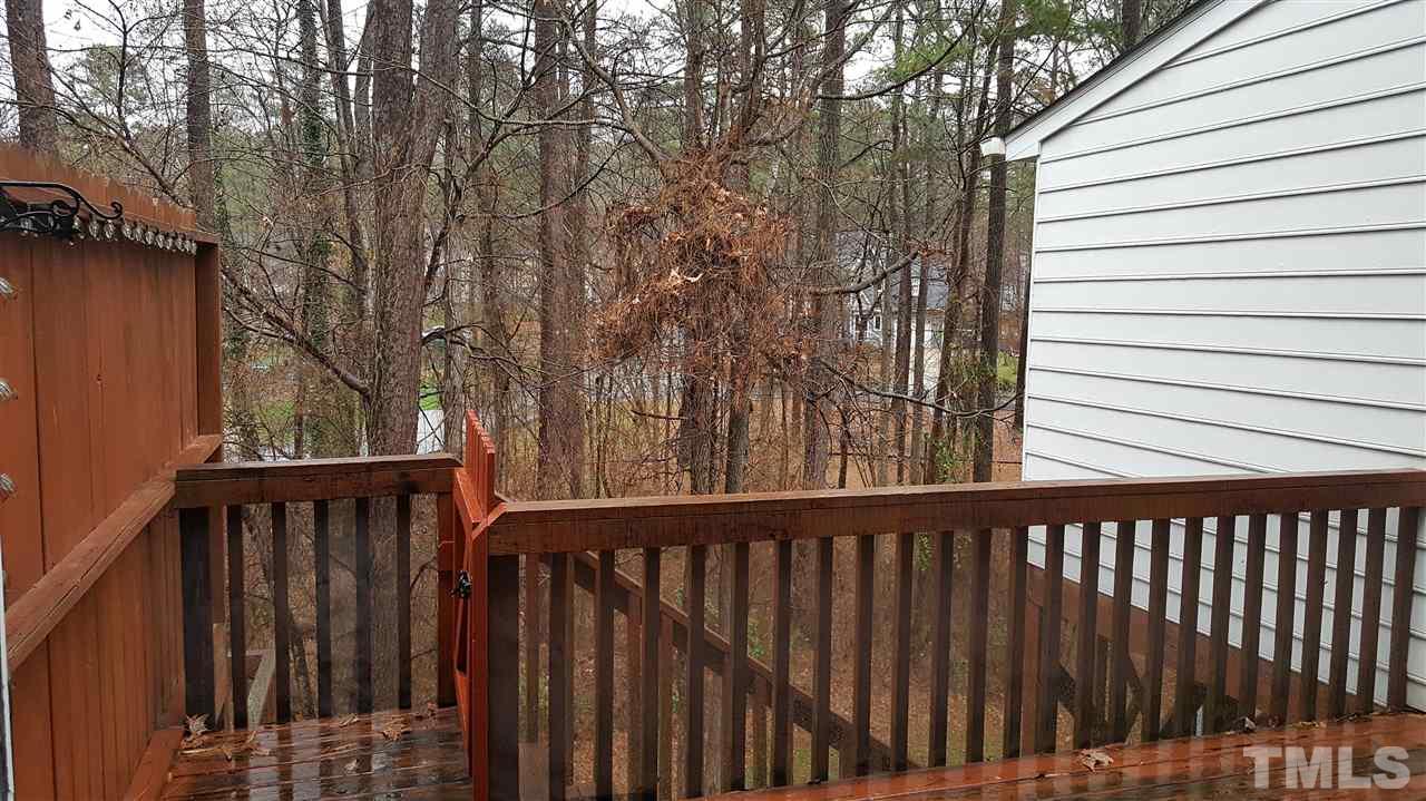 6036 Epping Forest Drive Raleigh, NC 27613 - Photo 5 of 21 Deck overlooking wooded lot. Deck maintained by HOA. Deck Repair/Replace as needed, power wash and stain on Calendar for 2017 as per HOA.