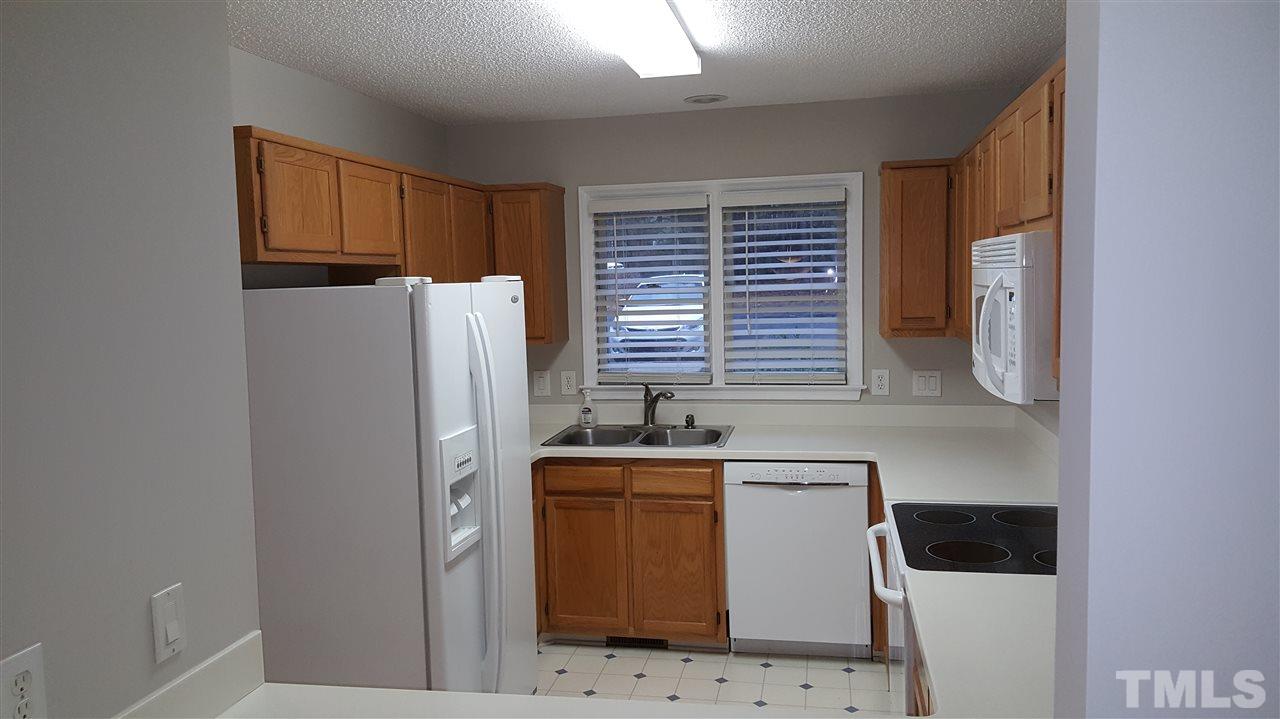 6036 Epping Forest Drive Raleigh, NC 27613 - Photo 6 of 21 Newer appliances. Refrigerator also conveys!