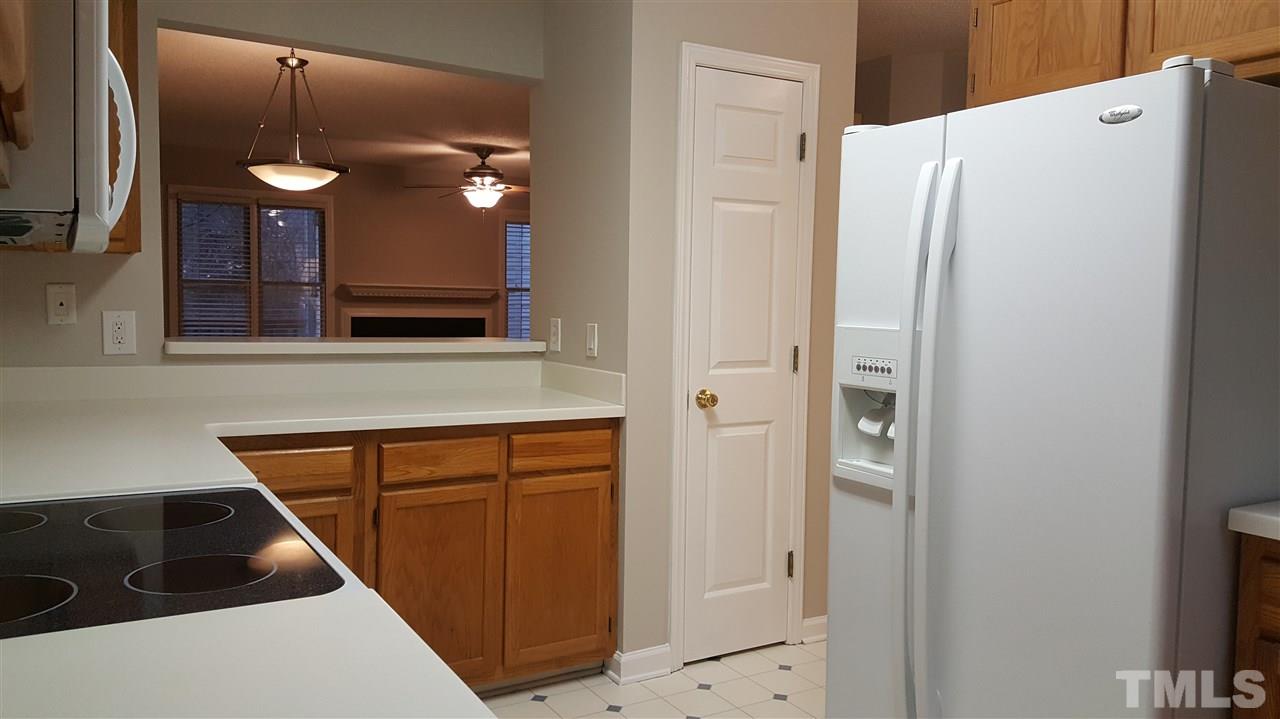 6036 Epping Forest Drive Raleigh, NC 27613 - Photo 7 of 21 Smooth-top Stove, over-the-range microwave Bosch dishwasher and refrigerator all convey