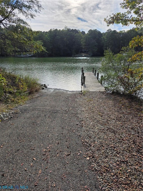 Water view featuring a boat ramp and a boat dock
