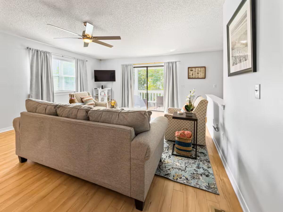 100 North Myrtle Drive, Unit 116 Santa Rosa Beach, FL 32459 - Photo 13 of 29 a living room with furniture and a flat screen tv