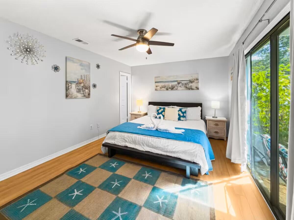 100 North Myrtle Drive, Unit 116 Santa Rosa Beach, FL 32459 - Photo 6 of 29 a bedroom with a bed and a large window