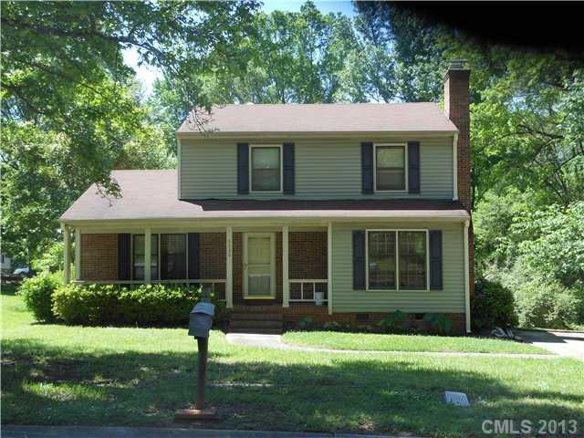9330 Barkridge Road Mint Hill, NC 28227 - Photo 1 of 1 a view of a house with a yard