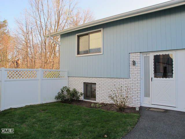 60 Whisconier Road, Unit 3 Brookfield, CT 06804 - Photo 1 of 1 a view of backyard of a house