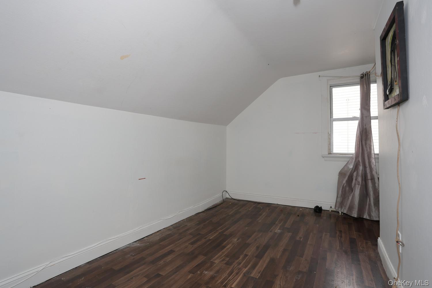 29 Fairview Avenue Spring Valley, NY 10977 - Photo 18 of 19 a view of small space with wooden floor and a window