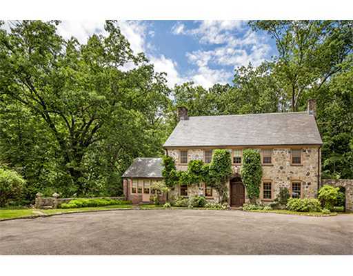 131 Old Mill Road Greenwich, CT 06831 - Photo 1 of 13 a backyard of a house with large trees