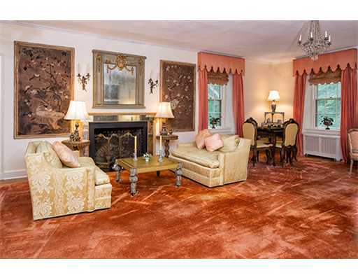 131 Old Mill Road Greenwich, CT 06831 - Photo 2 of 13 a living room with furniture a large window and a fireplace