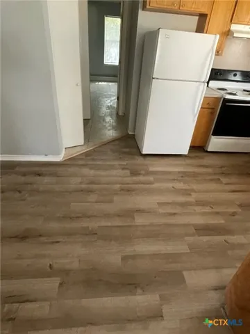a view of a utility room with washer and dryer