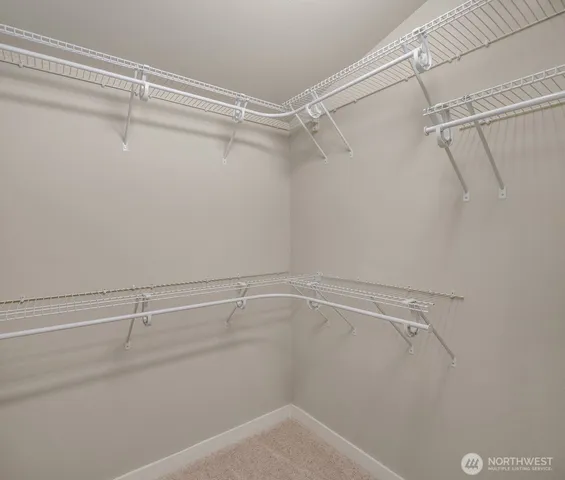a view of a room with racks on the wall