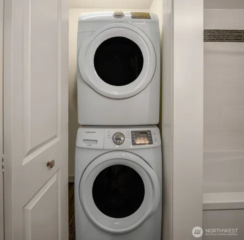 a utility room with dryer and washer